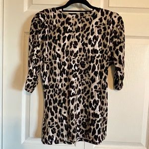 Dressy blouse with 3/4 length sleeves.